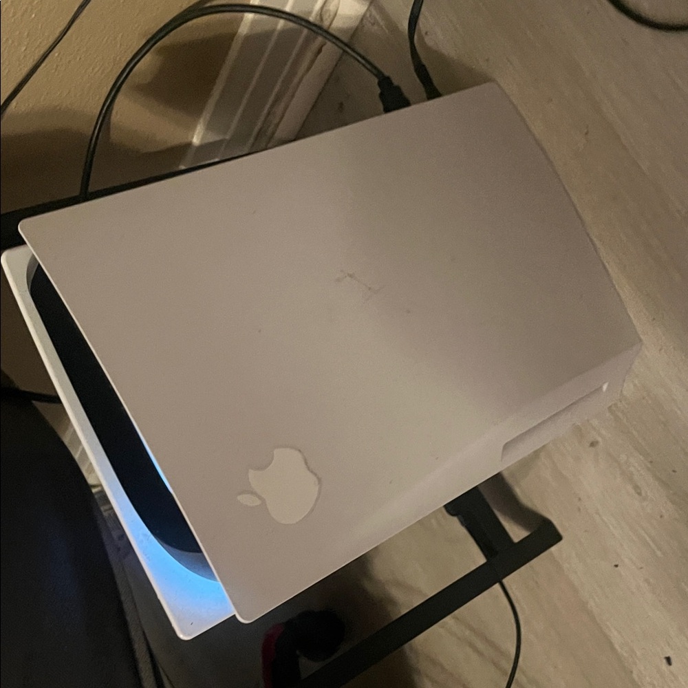 PS5 with controller and headset.